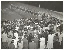 Frank Boggs boarding a plane